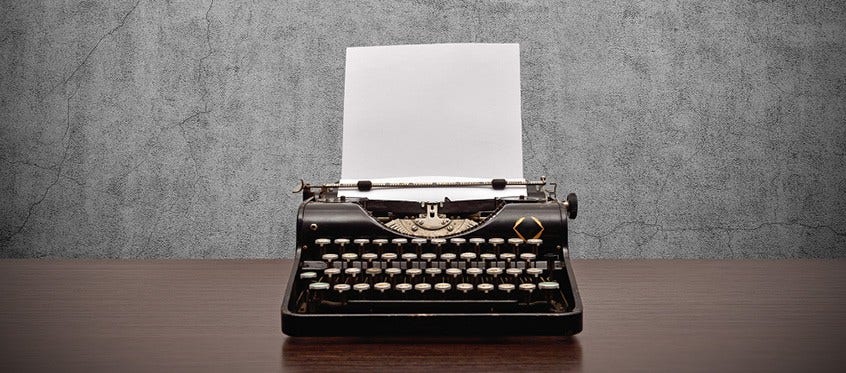 typewriter Person Using Vintage Typewriter as a Strategy to Prevent Ransomware Attacks