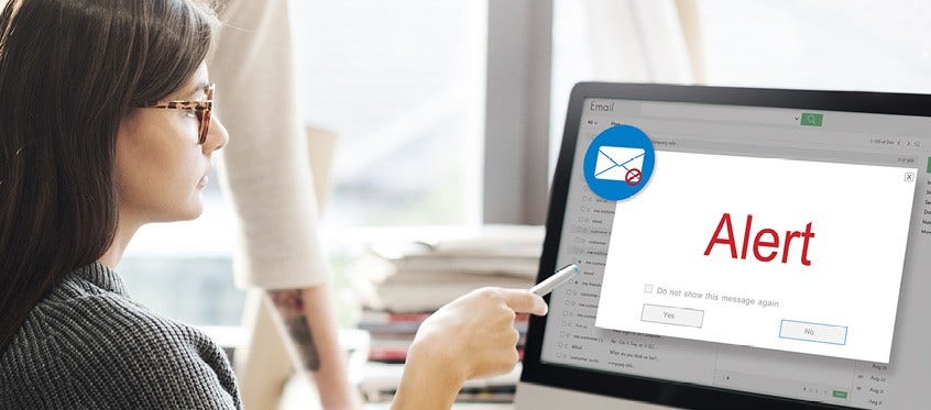 Email Alert Warning on Computer Employee Training Session on Preventing Ransomware Attacks